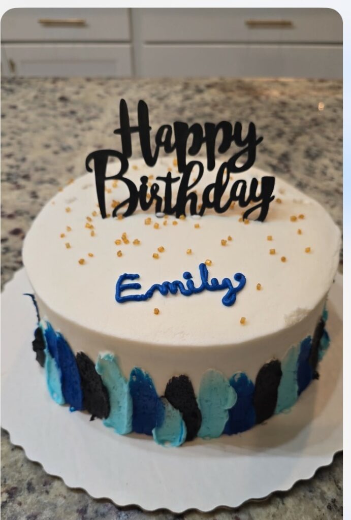 Birthday cake with the name Emily.